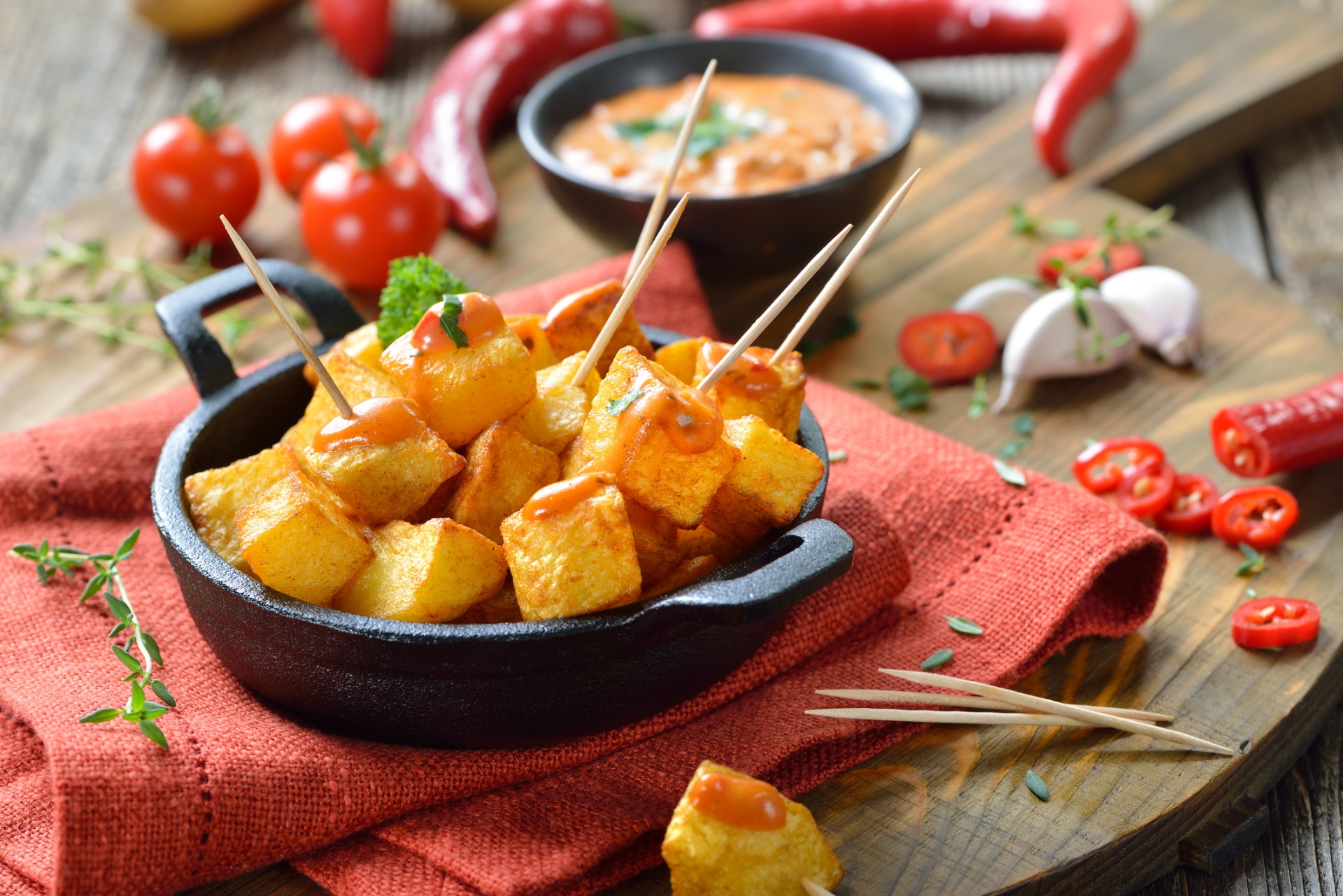 Artisanal Spanish tapas spread on ceramic plates